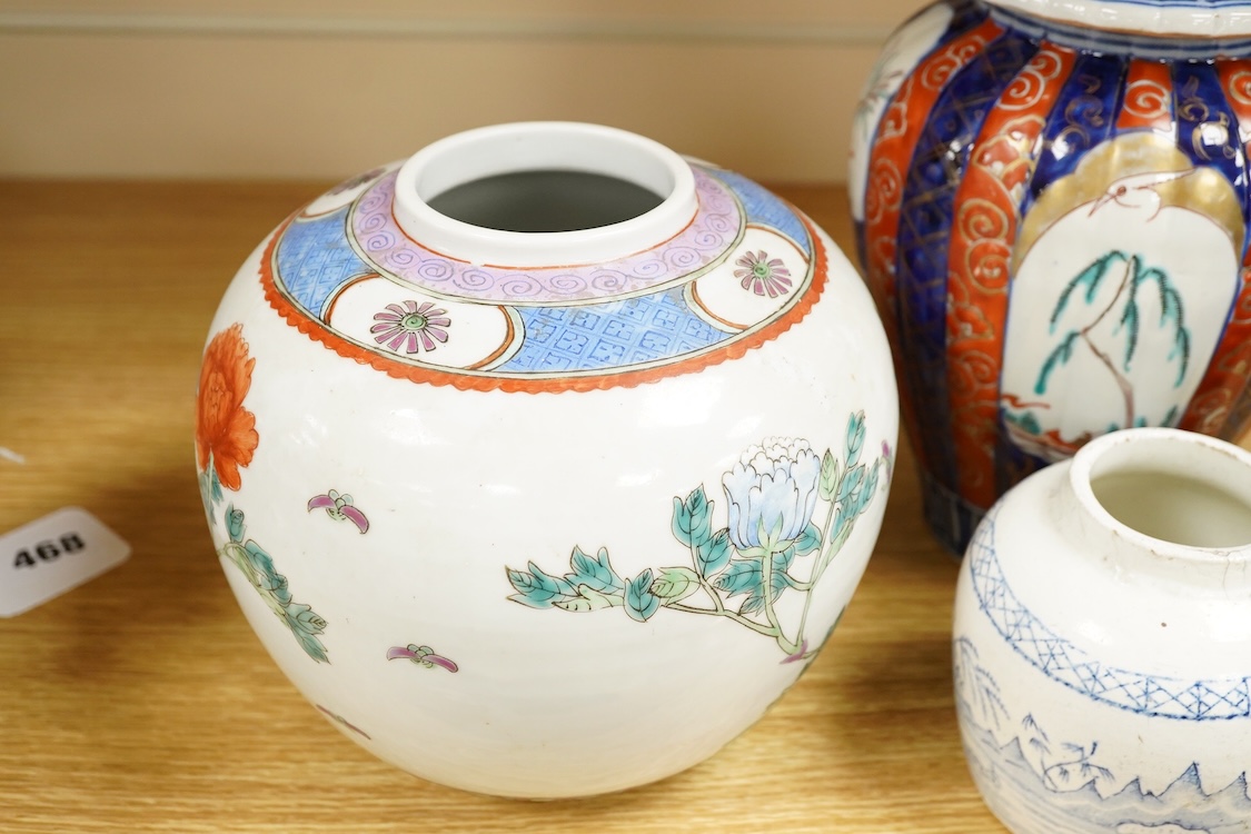 An Imari vase and cover-28cm high, a Chinese jar and prunus vase and a small blue and white jar.